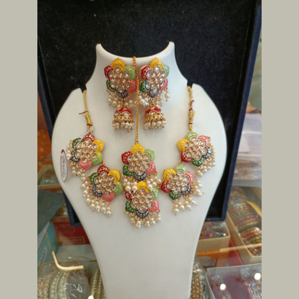 Elegant Indian Jewelry set with Tikka and earrings