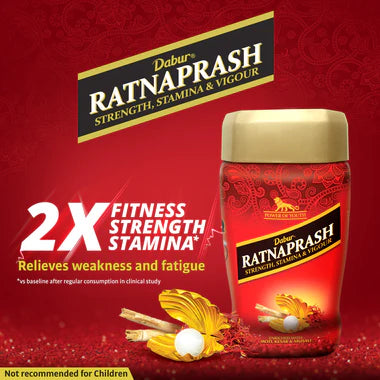 Dabur Ratnaprash product on a red background with branding and text.