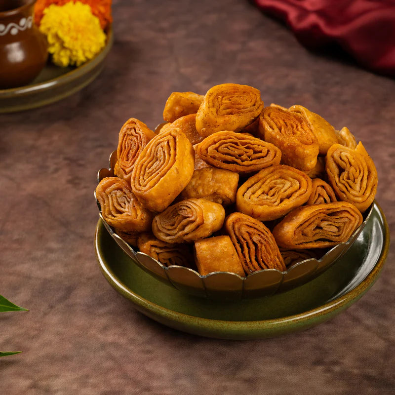 Close-up of Almond House Khara Khaja arranged in a decorative bowl
