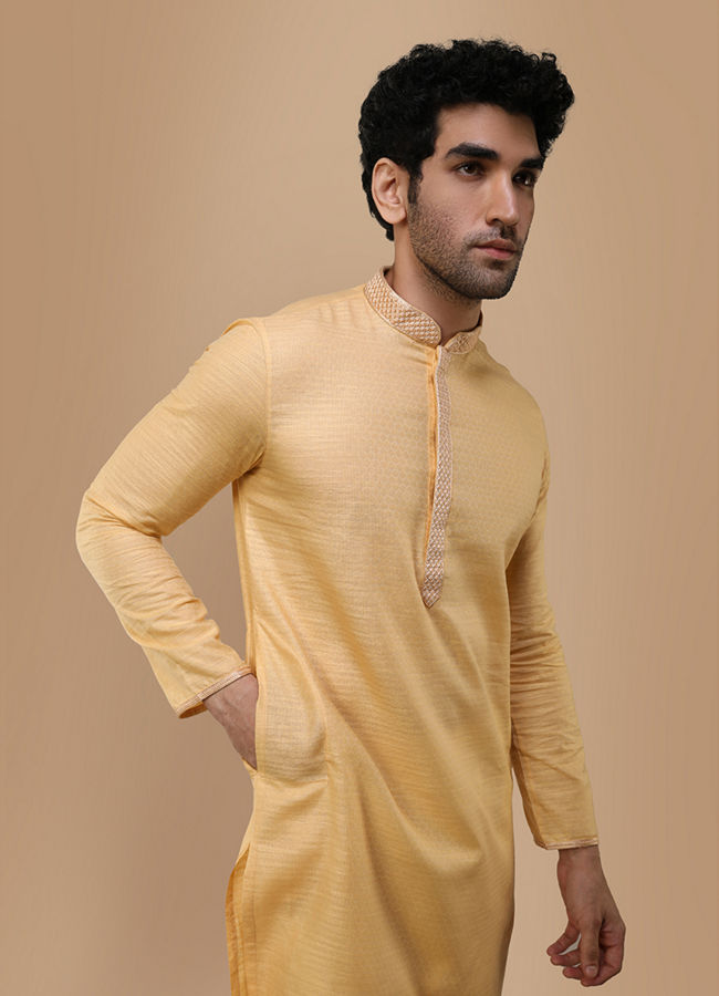 Manyawar Macaroon Yellow Self Design Kurta Set