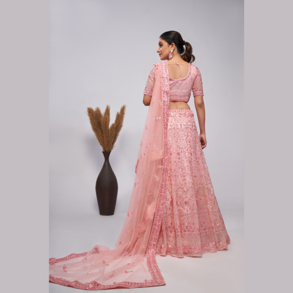 Blush Pink Sequins Androned With Pearl And Sequins Intricate Embellishments For Beautiful Bride Lehenga Choli