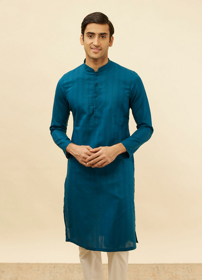 Manyawar Bright Blue Self Patterned Kurta Set