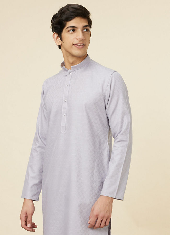 Manyawar Pastel Purple Self Patterned Kurta Set