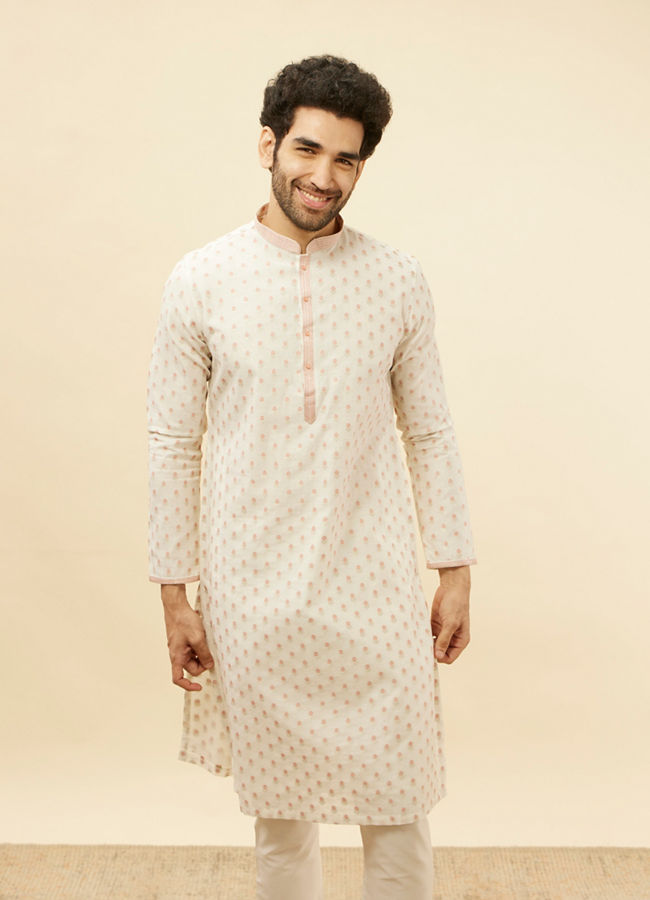 Manyawar White and Coral Pink Floral Motif Kurta Set