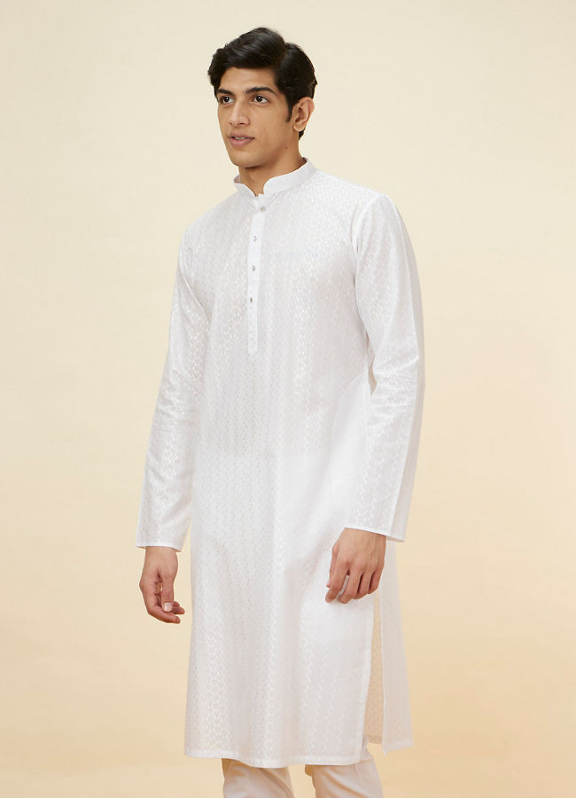 Manyawar Pristine White Self Patterned Kurta Set