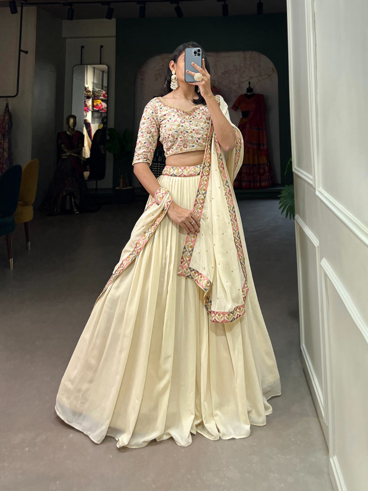 Off-White: Exquisitely Embroidered Lehenga Choli with Shimmering Sequins