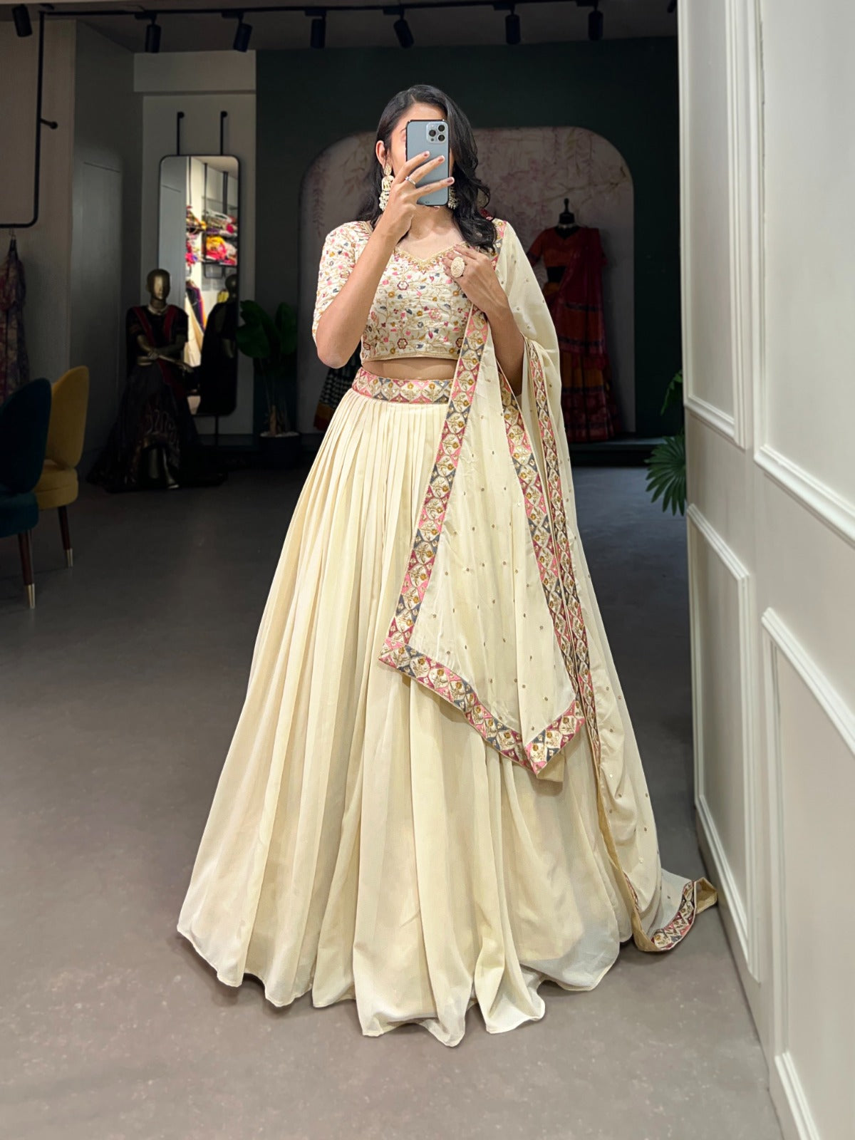 Off-White: Exquisitely Embroidered Lehenga Choli with Shimmering Sequins